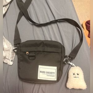 Mars Society Black Messenger Bag with Plush Charm